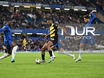 Emile Acquah (20 Barrow) is challenged by Axel Disasi (2 Chelsea) during the Carabao Cup Third Round match between Chelsea and Barrow at Sta...