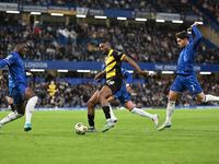 Emile Acquah (20 Barrow) is challenged by Axel Disasi (2 Chelsea) during the Carabao Cup Third Round match between Chelsea and Barrow at Sta...