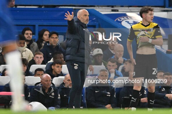 Manager Enzo Maresca gestures during the Carabao Cup Third Round match between Chelsea and Barrow at Stamford Bridge in London, England, on...