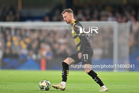 Elliot Newby (11 Barrow) controls the ball during the Carabao Cup Third Round match between Chelsea and Barrow at Stamford Bridge in London,...