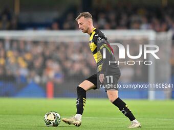 Elliot Newby (11 Barrow) controls the ball during the Carabao Cup Third Round match between Chelsea and Barrow at Stamford Bridge in London,...