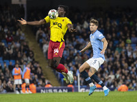 Kwadwo Baah #34 of Watford F.C. chests the ball during the Carabao Cup Third Round match between Manchester City and Watford at the Etihad S...