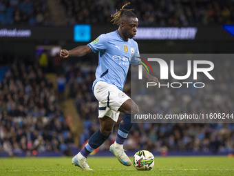 Jeremy Doku #11 of Manchester City F.C. during the Carabao Cup Third Round match between Manchester City and Watford at the Etihad Stadium i...