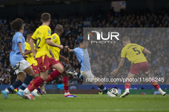 Matheus Nunes #27 of Manchester City F.C. shoots at goal during the Carabao Cup Third Round match between Manchester City and Watford at the...