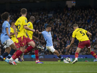 Matheus Nunes #27 of Manchester City F.C. shoots at goal during the Carabao Cup Third Round match between Manchester City and Watford at the...