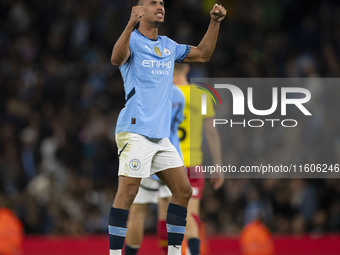 Matheus Nunes #27 of Manchester City F.C. celebrates his goal during the Carabao Cup Third Round match between Manchester City and Watford a...