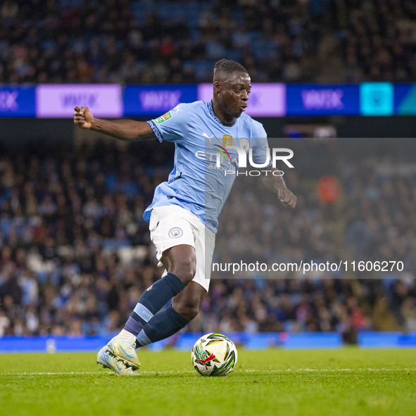 Jeremy Doku #11 of Manchester City F.C. is in action during the Carabao Cup Third Round match between Manchester City and Watford at the Eti...