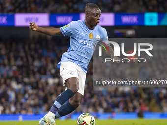 Jeremy Doku #11 of Manchester City F.C. is in action during the Carabao Cup Third Round match between Manchester City and Watford at the Eti...