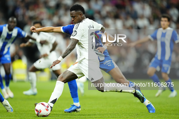 Vinicius Junior left winger of Real Madrid and Brazil shooting to goal during the La Liga match between Real Madrid CF and Deportivo Alavés...