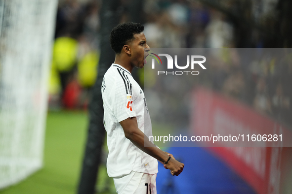 Rodrygo Goes right winger of Real Madrid and Brazil celebrates after scoring his sides first goal during the La Liga match between Real Madr...