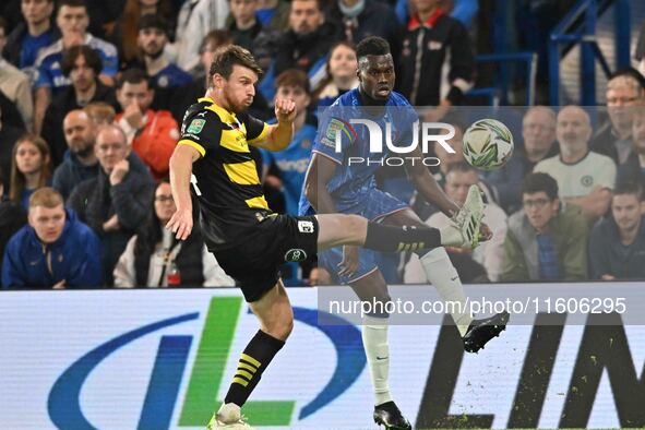 Curtis Stokes (14 Barrow) is in action during the Carabao Cup Third Round match between Chelsea and Barrow at Stamford Bridge in London on S...