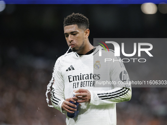 Jude Bellingham of Real Madrid spits during the La Liga 2024/25 match between Real Madrid and Alaves at Santiago Bernabeu Stadium in Madrid,...