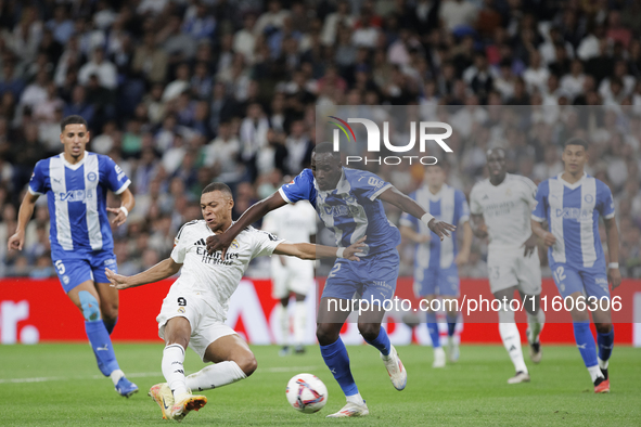 Kylian Mbappe of Real Madrid scores a goal during the La Liga 2024/25 match between Real Madrid and Alaves at Santiago Bernabeu Stadium in M...