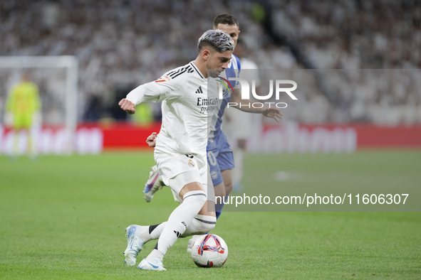 Federico Valverde of Real Madrid is in action during the La Liga 2024/25 match between Real Madrid and Alaves at Santiago Bernabeu Stadium i...