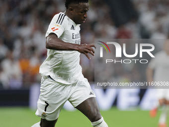 Vinicius Jr of Real Madrid is in action during the La Liga 2024/25 match between Real Madrid and Alaves at Santiago Bernabeu Stadium in Madr...