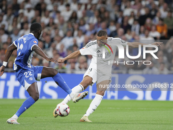 Kylian Mbappe of Real Madrid attempts a shot during the La Liga 2024/25 match between Real Madrid and Alaves at Santiago Bernabeu Stadium in...