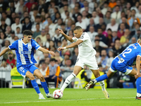 Kylian Mbappe centre-forward of Real Madrid and France in action during the La Liga match between Real Madrid CF and Deportivo Alavés at Est...