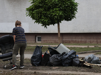 A person cleans up after flooding in Lewin Brzeski, Poland on September 23, 2024. (