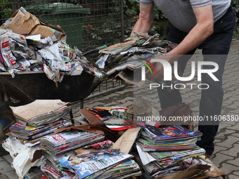 A person cleans up after flooding in Lewin Brzeski, Poland on September 23, 2024. (