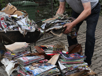 A person cleans up after flooding in Lewin Brzeski, Poland on September 23, 2024. (