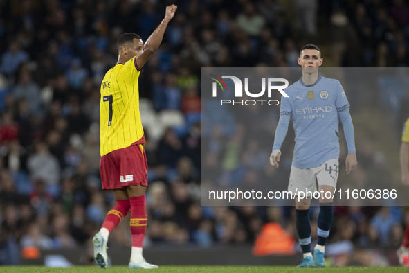 Tom Ince #7 of Watford F.C. celebrates his goal during the Carabao Cup Third Round match between Manchester City and Watford at the Etihad S...