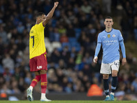 Tom Ince #7 of Watford F.C. celebrates his goal during the Carabao Cup Third Round match between Manchester City and Watford at the Etihad S...