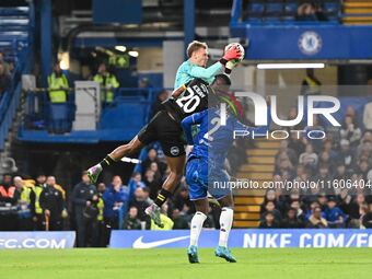 Emile Acquah (20 Barrow) challenges Filip Jorgensen (12 Chelsea) during the Carabao Cup Third Round match between Chelsea and Barrow at Stam...