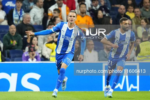 Kike Garcia centre-forward of Alaves and Spain celebrates after scoring his sides first goal during the La Liga match between Real Madrid CF...