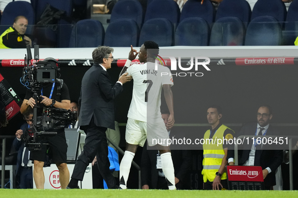 Vinicius Junior left winger of Real Madrid and Brazil protest to referee after is replaced during the La Liga match between Real Madrid CF a...