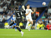 Arda Guler attacking midfield of Real Madrid and Turkey and Antonio Sivera goalkeeper of Alaves and Spain compete for the ball during the La...