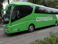 Mothers and fathers of the 43 disappeared students from Ayotzinapa and their companions, on board a bus outside the Senate of the Republic i...