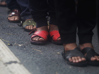 The 43 missing students from Ayotzinapa throw firecrackers on Tuesday, September 24, 2024, and demonstrate outside the Senate of the Republi...