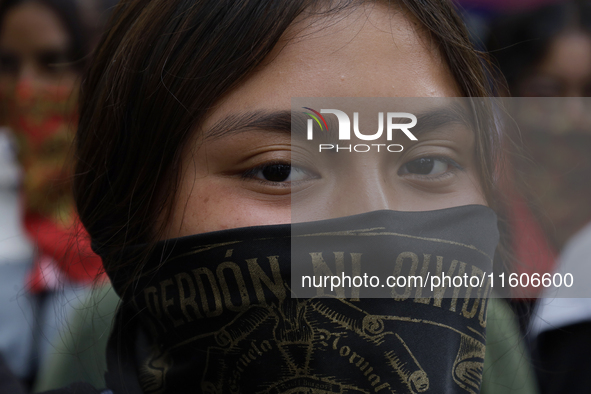 The 43 missing students from Ayotzinapa throw firecrackers on Tuesday, September 24, 2024, and demonstrate outside the Senate of the Republi...