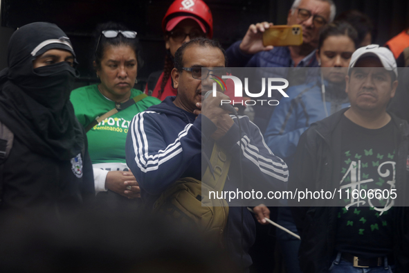 Vidulfo Rosales, lawyer, accompanies the mothers and fathers of the 43 disappeared students of Ayotzinapa and their companions, demonstratin...