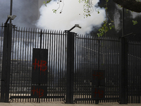 The 43 missing students from Ayotzinapa throw firecrackers at the Senate of the Republic in Mexico City, Mexico, on September 24, 2024, to d...