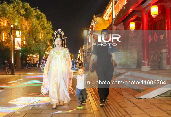 Tourists visit the ancient town of Xunxian in Hebi, China, on September 24, 2024. 