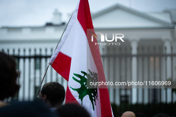 People demonstrate in front of the White House in support of Lebanon, following extensive air strikes by Israel, in Washington, DC, on Septe...