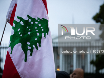 People demonstrate in front of the White House in support of Lebanon, following extensive air strikes by Israel, in Washington, DC, on Septe...