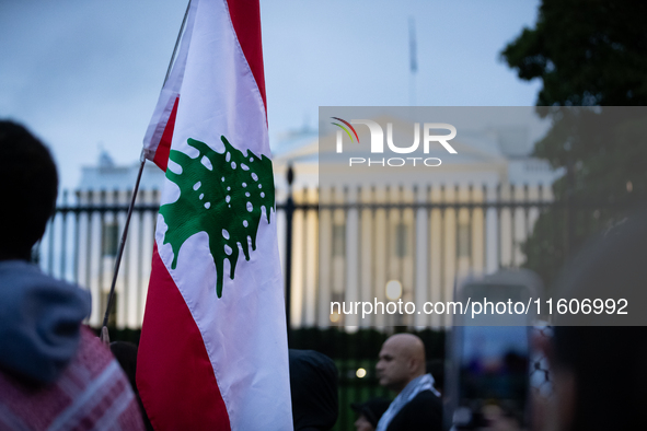 People demonstrate in front of the White House in support of Lebanon, following extensive air strikes by Israel, in Washington, DC, on Septe...