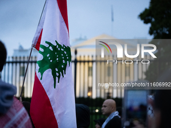 People demonstrate in front of the White House in support of Lebanon, following extensive air strikes by Israel, in Washington, DC, on Septe...