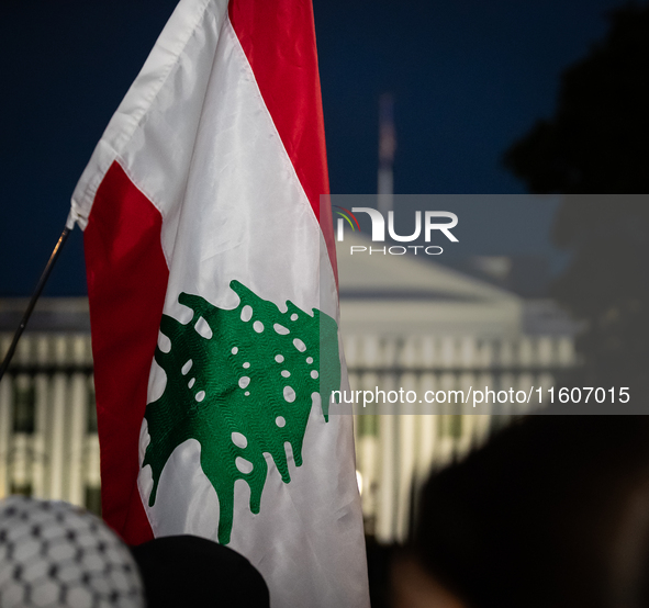 People demonstrate in front of the White House in support of Lebanon, following extensive air strikes by Israel, in Washington, DC, on Septe...