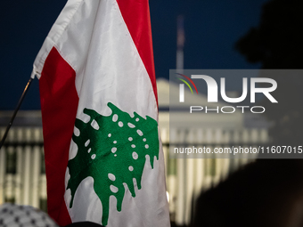 People demonstrate in front of the White House in support of Lebanon, following extensive air strikes by Israel, in Washington, DC, on Septe...