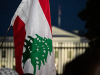 People demonstrate in front of the White House in support of Lebanon, following extensive air strikes by Israel, in Washington, DC, on Septe...