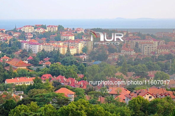 A photo taken on August 30, 2024, shows the distinctive urban buildings in Qingdao, China. On September 24, 2024, the State Council Informat...