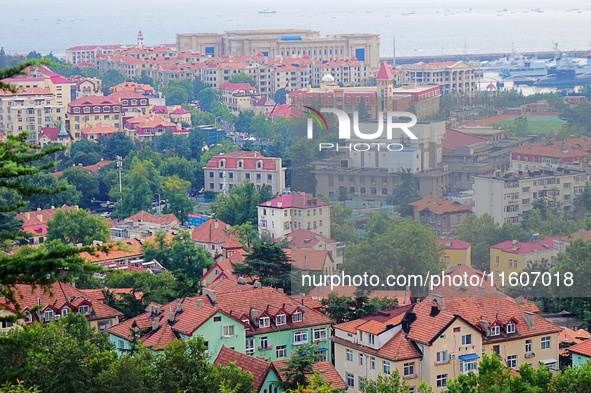 A photo taken on August 30, 2024, shows the distinctive urban buildings in Qingdao, China. On September 24, 2024, the State Council Informat...