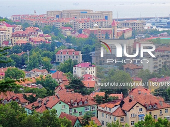 A photo taken on August 30, 2024, shows the distinctive urban buildings in Qingdao, China. On September 24, 2024, the State Council Informat...