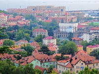 A photo taken on August 30, 2024, shows the distinctive urban buildings in Qingdao, China. On September 24, 2024, the State Council Informat...