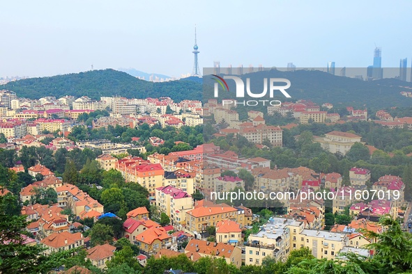 A photo taken on August 30, 2024, shows the distinctive urban buildings in Qingdao, China. On September 24, 2024, the State Council Informat...