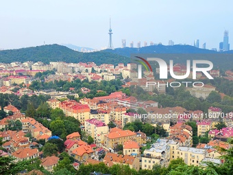 A photo taken on August 30, 2024, shows the distinctive urban buildings in Qingdao, China. On September 24, 2024, the State Council Informat...