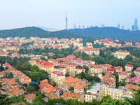 A photo taken on August 30, 2024, shows the distinctive urban buildings in Qingdao, China. On September 24, 2024, the State Council Informat...